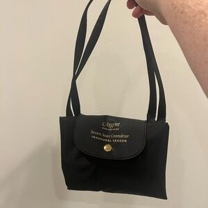 NWOT regent cruises inaugural tote bag black. Fold up.